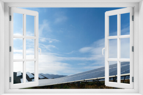 Fototapeta Naklejka Na Ścianę Okno 3D - Panoramic photo of part of energy solar batteries in the outdoors