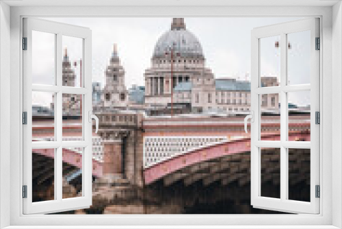 Fototapeta Naklejka Na Ścianę Okno 3D - Bridge in London and St. Pauls Cathedral in the background