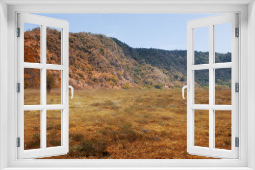 Fototapeta Naklejka Na Ścianę Okno 3D - Meadow field with hills