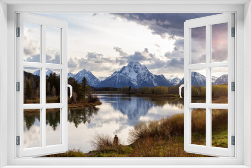 Fototapeta Naklejka Na Ścianę Okno 3D - River surrounded by Trees and Mountains in American Landscape. Snake River, Oxbow Bend. Spring Season. Grand Teton National Park. Wyoming, United States. Nature Background Panorama. Sunset Cloudy Sky