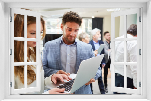 Business people doing research on the laptop PC