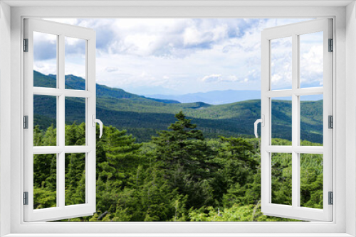 Fototapeta Naklejka Na Ścianę Okno 3D - 夏の北八ヶ岳　『高見石』山頂からの風景　雨池と上越信州の山々を望む