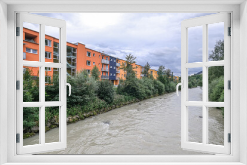 Fototapeta Naklejka Na Ścianę Okno 3D - View of Enns river flowing through the town of Schladming, Styria, Austria