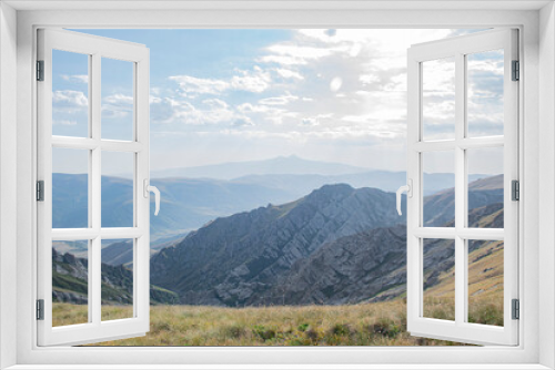 Fototapeta Naklejka Na Ścianę Okno 3D - landscape and clouds  in the mountains