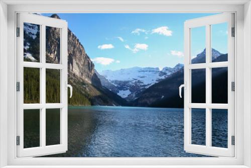 Fototapeta Naklejka Na Ścianę Okno 3D - Late afternoon as the sun is getting low in the sky over Lake Louise Alberta.