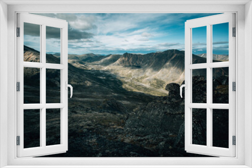 Fototapeta Naklejka Na Ścianę Okno 3D - Mountain range surrounding a valley