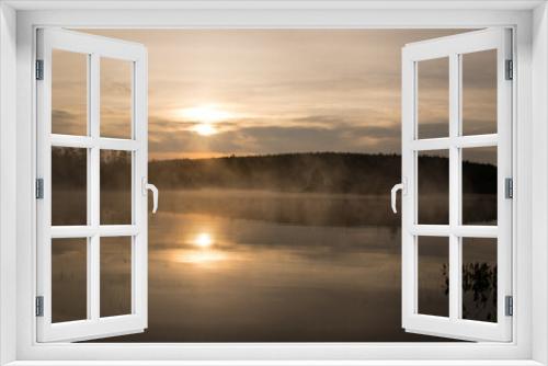 Fototapeta Naklejka Na Ścianę Okno 3D - Calm lake with mist rising