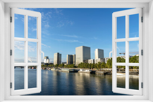 Fototapeta Naklejka Na Ścianę Okno 3D - Part of the embankment of the river Seine close-up, National Library of France in Paris.