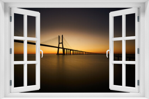Fototapeta Naklejka Na Ścianę Okno 3D - Vasco da Gama Bridge in Lisbona, Portugal, at sunrise
