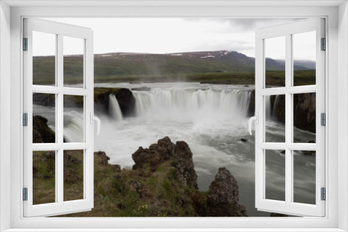 Fototapeta Naklejka Na Ścianę Okno 3D - Goðafoss waterfall in northern Iceland, located along the country's main ring road. The water of the river Skjálfandafljót falls from a height of 12 metres over a width of 30 metres.