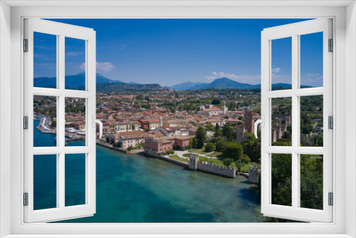 Fototapeta Naklejka Na Ścianę Okno 3D - The historical part of the city of Lazise, coastline. Aerial view of Lazise city, Verona. Drone view of Lazise town on Lake Garda Italy.