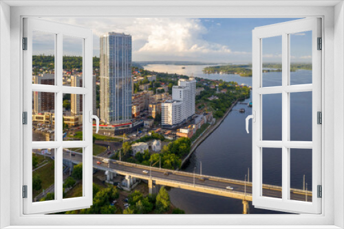 Fototapeta Naklejka Na Ścianę Okno 3D - Aerial view of Saratov, Elena Skyscraper and the bridge across Volga, Russia.