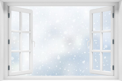 Winter snowfall and snowflakes on light blue background. Xmas and New Year background. Vector