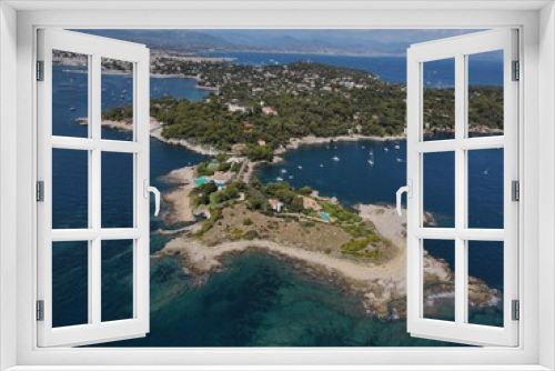 Fototapeta Naklejka Na Ścianę Okno 3D - Aerial view of Cap d'Antibes and  Billionaire's Bay. Beautiful rocky beach near coastal path on the Cap d'Antibes, Antibes, France. Drone view from above of Côte d’Azur near Juan-les-Pins and Cannes.