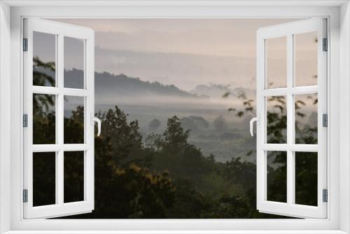 Fototapeta Naklejka Na Ścianę Okno 3D - Scenic mountain and cloud landscape.
Beautiful landscape of the forest and cloud background in a mist tropical green plants in a jungle.