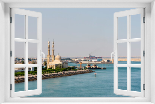 Fototapeta Naklejka Na Ścianę Okno 3D - Cityscape with Egyptian Mosque  in the city of Tawfiq (Suburb of Suez), on the southern end of the Suez Canal before exiting into the Red Sea. 