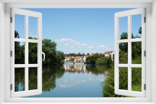 Fototapeta Naklejka Na Ścianę Okno 3D - The view of the Neckar river embankment in Nuertingen, Germany	