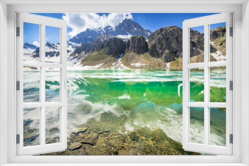 Fototapeta Naklejka Na Ścianę Okno 3D - Alpine emerald lake and mountains at springtime, Gran Paradiso Alps, Italy
