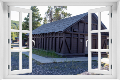 Fototapeta Naklejka Na Ścianę Okno 3D - Rustic public restrooms and showers in the Old Faithful Lodge for campers and cabin guests to use during their stay