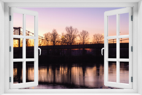 Fototapeta Naklejka Na Ścianę Okno 3D - Pont suspendu de Marmande, photographié pendant le coucher du soleil