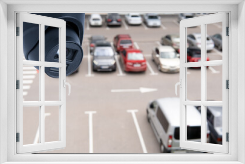Fototapeta Naklejka Na Ścianę Okno 3D - Technician installed IP CCTV camera hi-technology for look security area of work in car parking lot show signage with security cars park in area