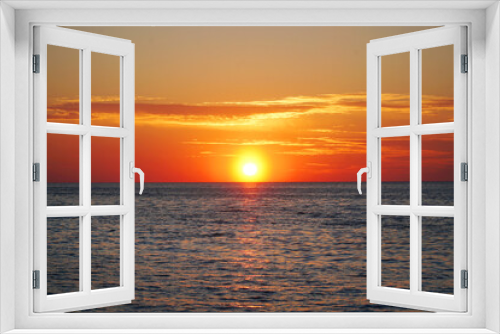 Fototapeta Naklejka Na Ścianę Okno 3D - Beautiful orange sunset on the sea