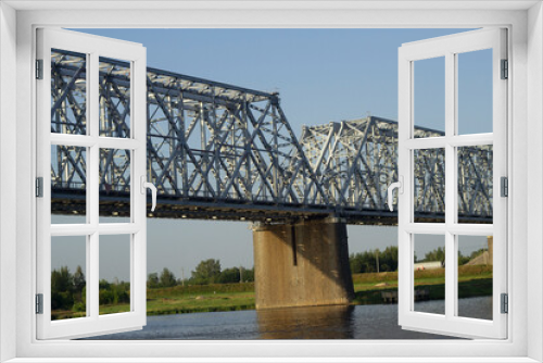 Fototapeta Naklejka Na Ścianę Okno 3D - A huge beautiful railway bridge on the Volga, a navigable span. Yaroslavl,