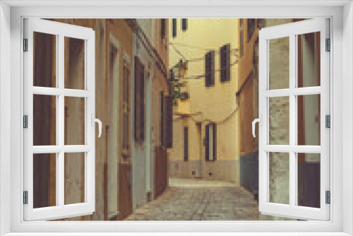 Fototapeta Naklejka Na Ścianę Okno 3D - Back streets of Cuitadella in Menorca, Spain