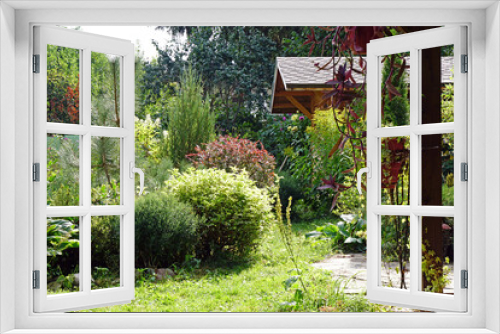 Fototapeta Naklejka Na Ścianę Okno 3D - Beautiful summer garden. House, in the garden