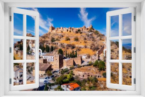 Fototapeta Naklejka Na Ścianę Okno 3D - An aerial view with the drone of the mountain village of Moclin in Spain,Hilltop fortress Lindos Rhodes