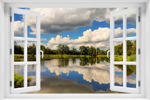 Fototapeta Naklejka Na Ścianę Okno 3D - Chmury nad jeziorem