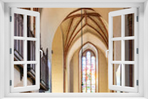 Aisle of historic Holy Mary gothic Kosciol Mariacki church in old town quarter of Trzebiatow in Poland