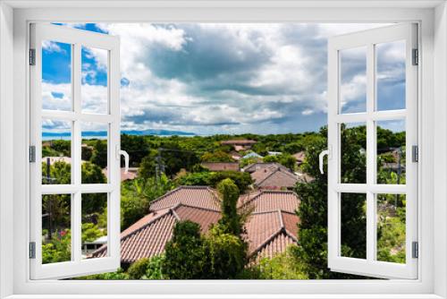 Fototapeta Naklejka Na Ścianę Okno 3D - 高台から見下ろす集落　竹富島