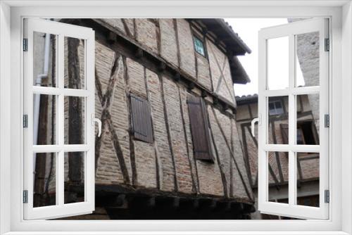 Fototapeta Naklejka Na Ścianę Okno 3D - old shutters on historic houses in France
