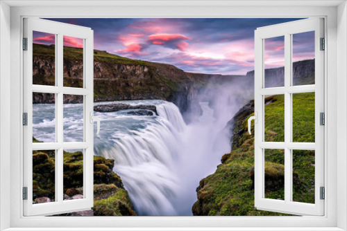 Fototapeta Naklejka Na Ścianę Okno 3D - Amazing Nature landscape of Iceland. Impressively beautiful Gullfoss waterfall in canyon with colorful sky during sunset. Tipical Iceland scenery. Iconic location for photographers and bloggers