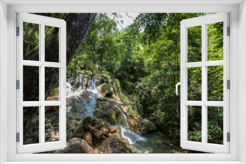 Fototapeta Naklejka Na Ścianę Okno 3D - Landscape view of Erawan waterfall kanchanaburi thailand.Erawan National Park is home to one of the most popular falls in the thailand.The sixth level of Erawan waterfall is called 