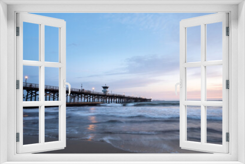 Fototapeta Naklejka Na Ścianę Okno 3D - Seal Beach Pier Long Exposure Reflections at Blue Hour