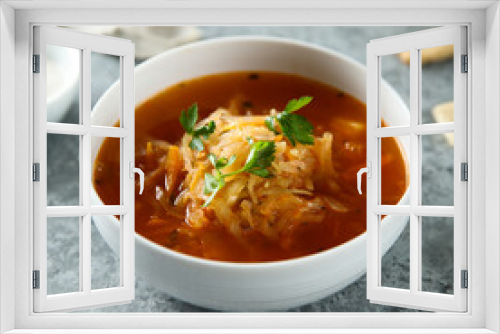 Fototapeta Naklejka Na Ścianę Okno 3D - Traditional sauerkraut soup with fresh parsley