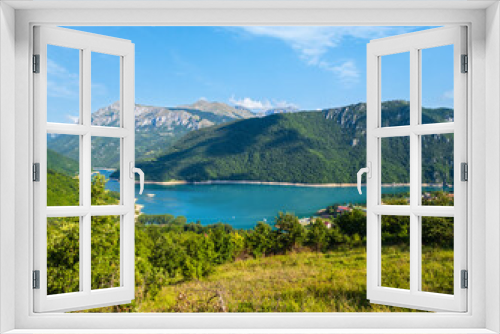 Fototapeta Naklejka Na Ścianę Okno 3D - Piva Lake (Pivsko Jezero) and Pluzine town view in Montenegro.