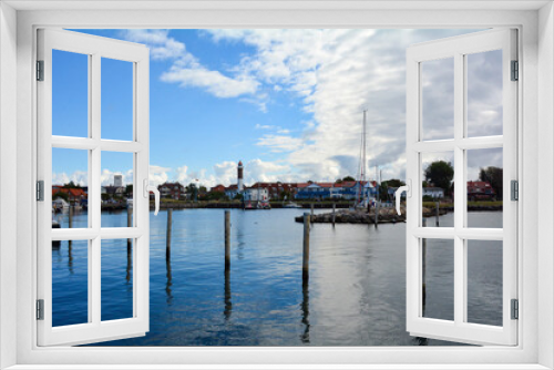 Fototapeta Naklejka Na Ścianę Okno 3D - The Harbor overlooking Timmendorf Strand, with blue sky, Poel Island, Baltic Sea, Germany