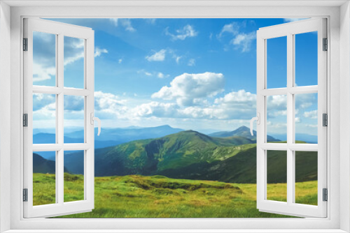 Fototapeta Naklejka Na Ścianę Okno 3D - Amazing alps panorama green meadow and mountain range. Blue sky and clouds in sunny day. Beautiful natural summer scenery. Alpine highlands nature landscape. Travel adventure concept image. Copy space