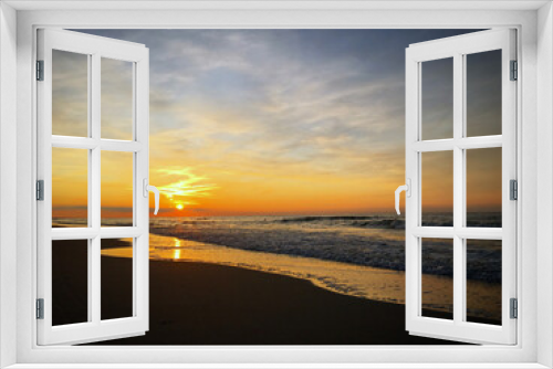 Fototapeta Naklejka Na Ścianę Okno 3D - Zachod słońca morze fale bosko niebo plaza