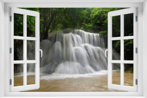 Fototapeta Naklejka Na Ścianę Okno 3D - beautiful waterfall in green forest