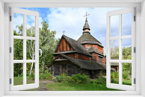 Fototapeta Naklejka Na Ścianę Okno 3D - Old wooden church in the village 