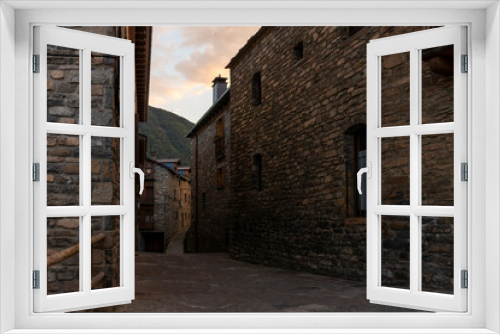 Fototapeta Naklejka Na Ścianę Okno 3D - stone street in the town of oto at the entrance of the e ordesa national park in the spanish pyrenees at sunset