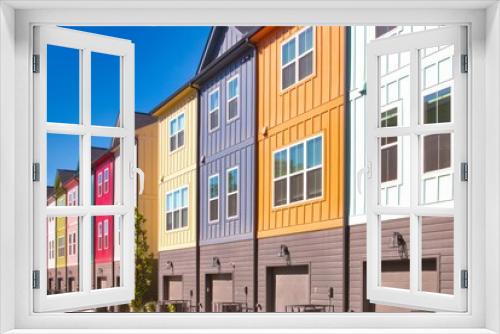 Fototapeta Naklejka Na Ścianę Okno 3D - Colorful modern townhouses