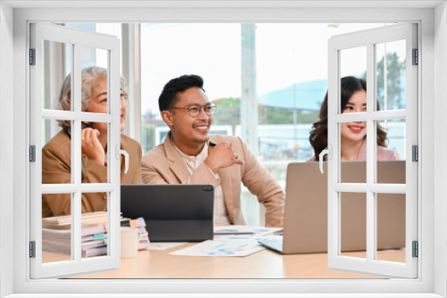 Group of Asian businesspeople are in the meeting, listening their staff presenting a project