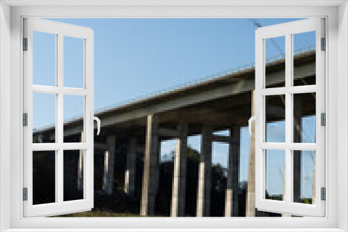 Fototapeta Naklejka Na Ścianę Okno 3D - Under the pillar bridge on a sunny day