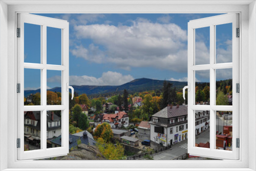 Fototapeta Naklejka Na Ścianę Okno 3D - view overlooking the town with picturesque nature in autumn. szklarska poreba, karkonosze, poland