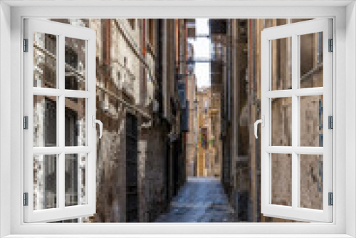 Fototapeta Naklejka Na Ścianę Okno 3D - Palermo, Sicily, Italy - July 6, 2020: Typical Italian street and buildings in the old town of Palermo, Sicily, Italy.